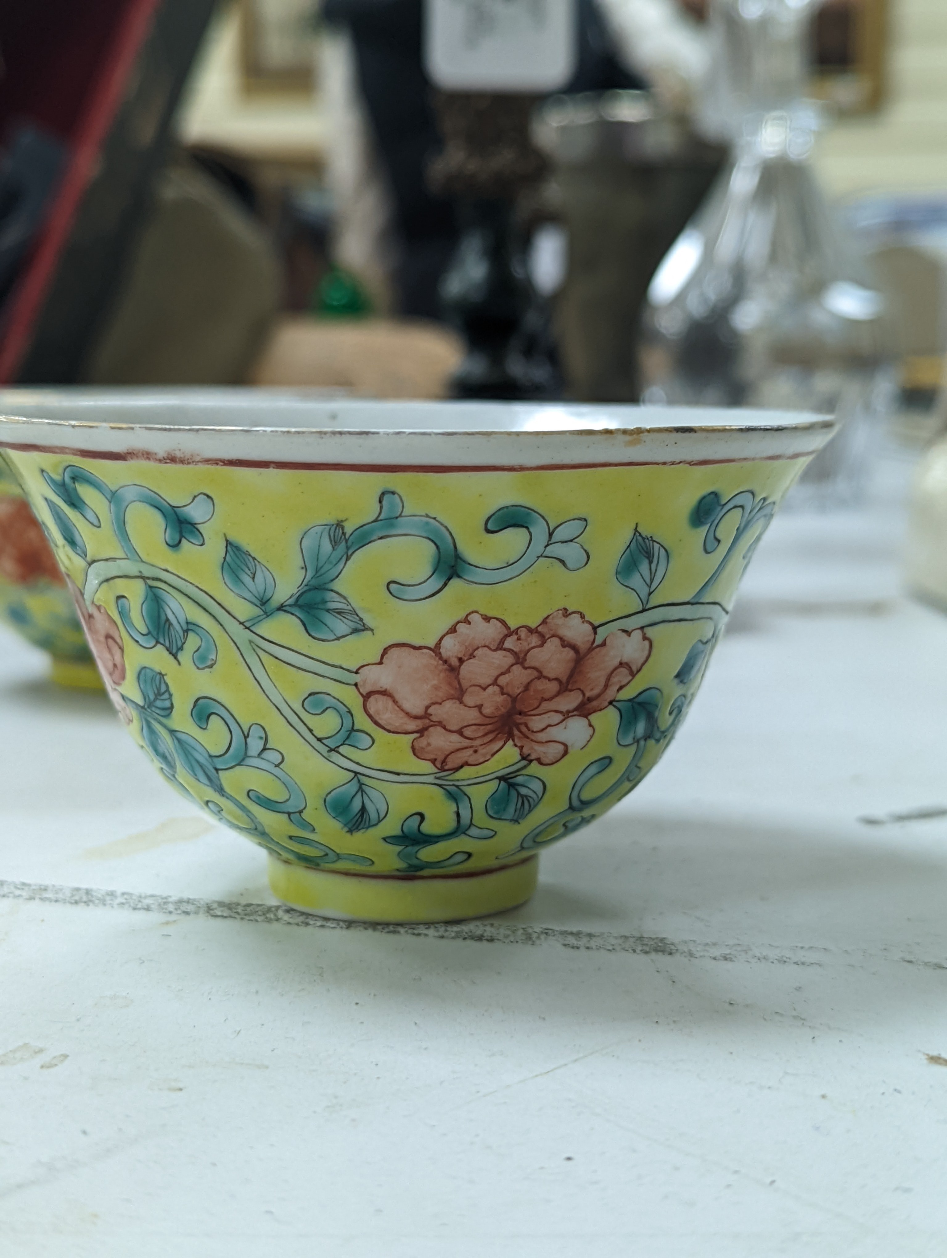 A group of Chinese porcelain, 19th /20th century, to include a pair of yellow ground bowls, 10.8 cm diameter, a blue and white vase, Xuande mark, a similar bowl and vase, and a champleve enamel bronze koro and cover